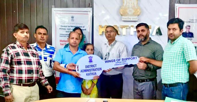 DC Kathua hands over motorized tricycles to specially-abled beneficiaries