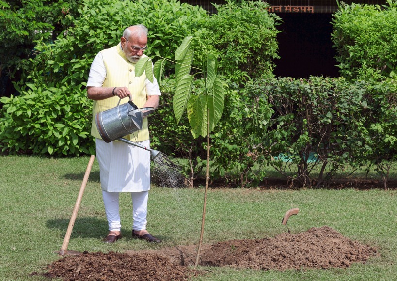 Prime Minister Narendra Modi plants Kadamb sapling gifted by King Charles on his birthday