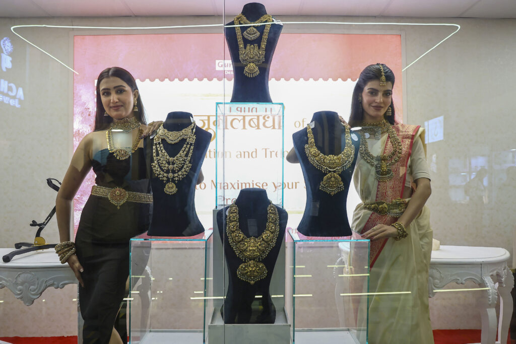 Gold futures hit record Rs 1.58 lakh/10g; breach USD 4,800 per ounce in global market