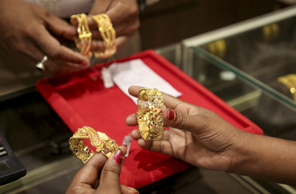 Gold trades flat at Rs 1.46 lakh/10g; silver slips Rs 100