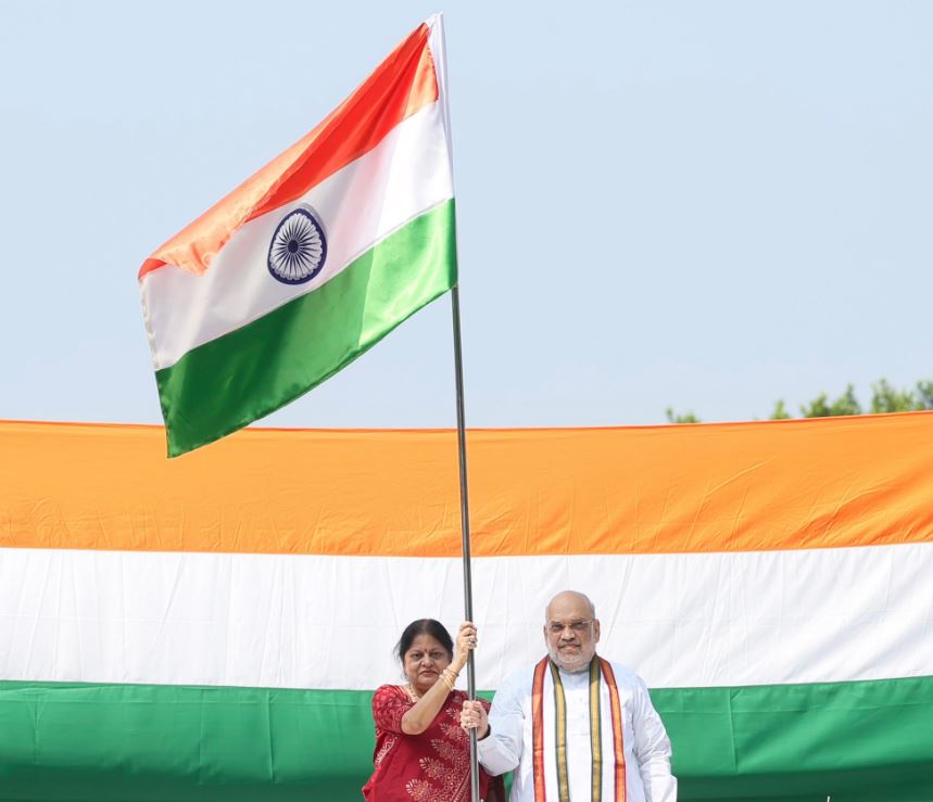 Union Home Minister Amit Shah hoists Tiranga at his residence under Har Ghar Tiranga campaign