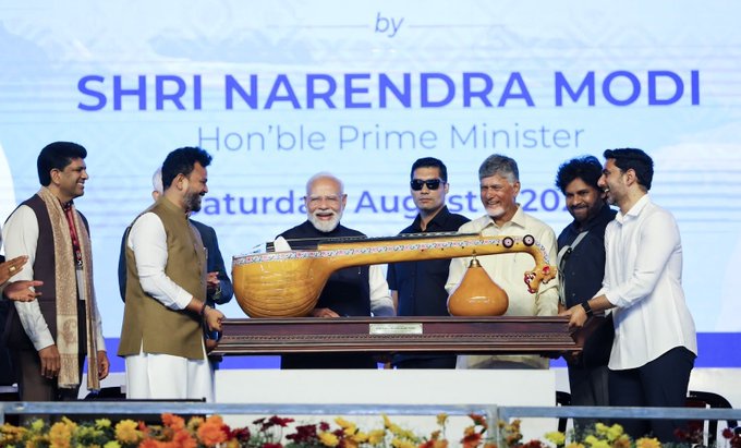 Prime Minister Narendra Modi receives handcrafted Bobbili Ekanda Veena during Bhogapuram airport inauguration; lauds Andhra Pradesh artisans