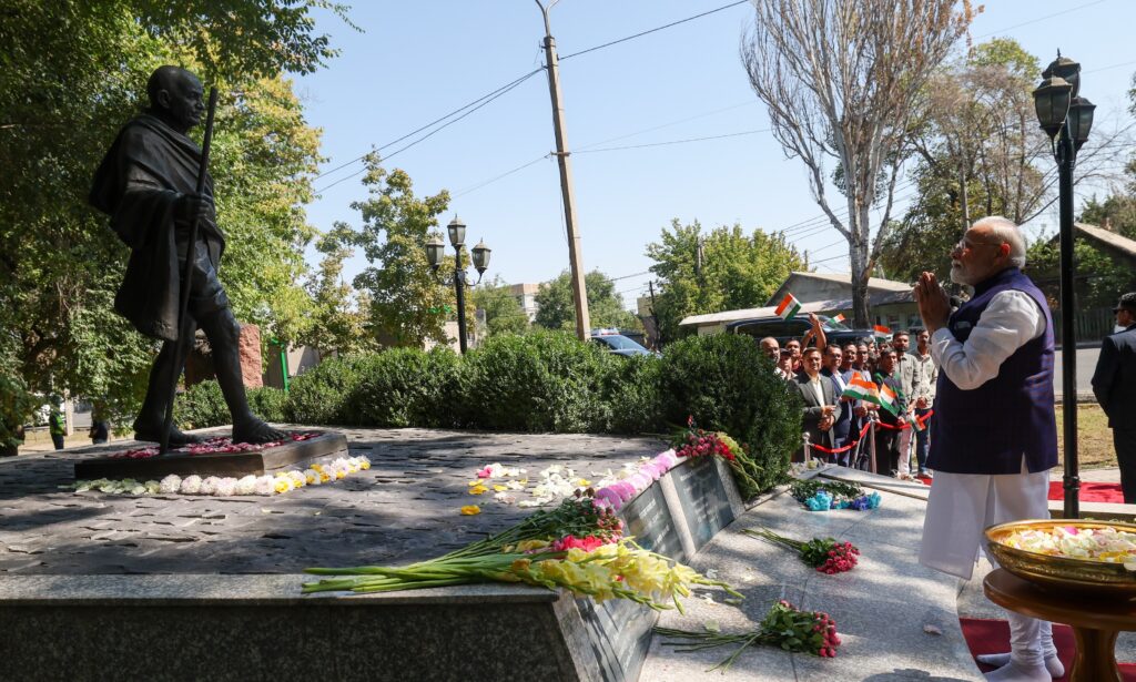 Prime Minister Narendra Modi pays floral tribute to Mahatma Gandhi in Bishkek, meets diaspora and other community members
